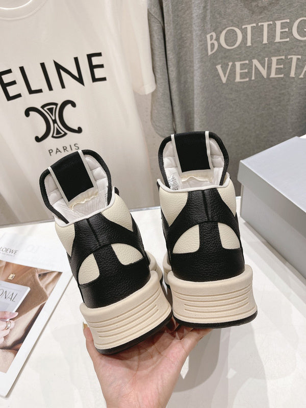 Rick Owens High-top Sneakers - Black Unisex Streetwear Limited Edition - **Rick Owens High-Top Sneakers: Dual-Tone Elegance and Craftsmanship** Step up your fashion game with Rick
