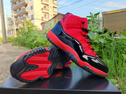 JORDAN 11 And Red - Black Unisex Streetwear Limited Edition - The Air Jordan 11 showcased here is a vibrant and energetic take on the classic