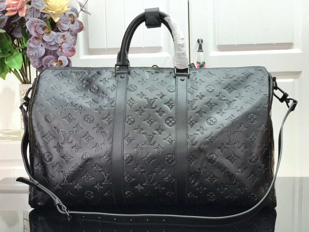 LOUIS VUITTON KEEPBALL 50 BLACK LEATHER TRAVEL BAG - side view - replica sneakers