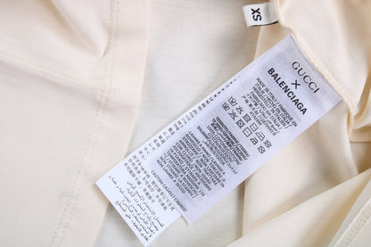 GUCCI - Balenciaga Drip Logo T-shirt - Cream Unisex Streetwear Limited Edition - The GUCCI x BALENCIAGA DRIP LOGO T-SHIRT CREAM - REPLICA blends luxury fashion with modern