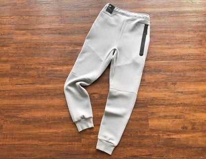 NIKE Tech Fleece Pants - Wolf Grey - Aquamarine - - Orange Unisex Streetwear Limited Edition - The NIKE TECH FLEECE PANTS WOLF GREY/AQUAMARINE/ORANGE - REPLICA offer a modern fusion of performance,