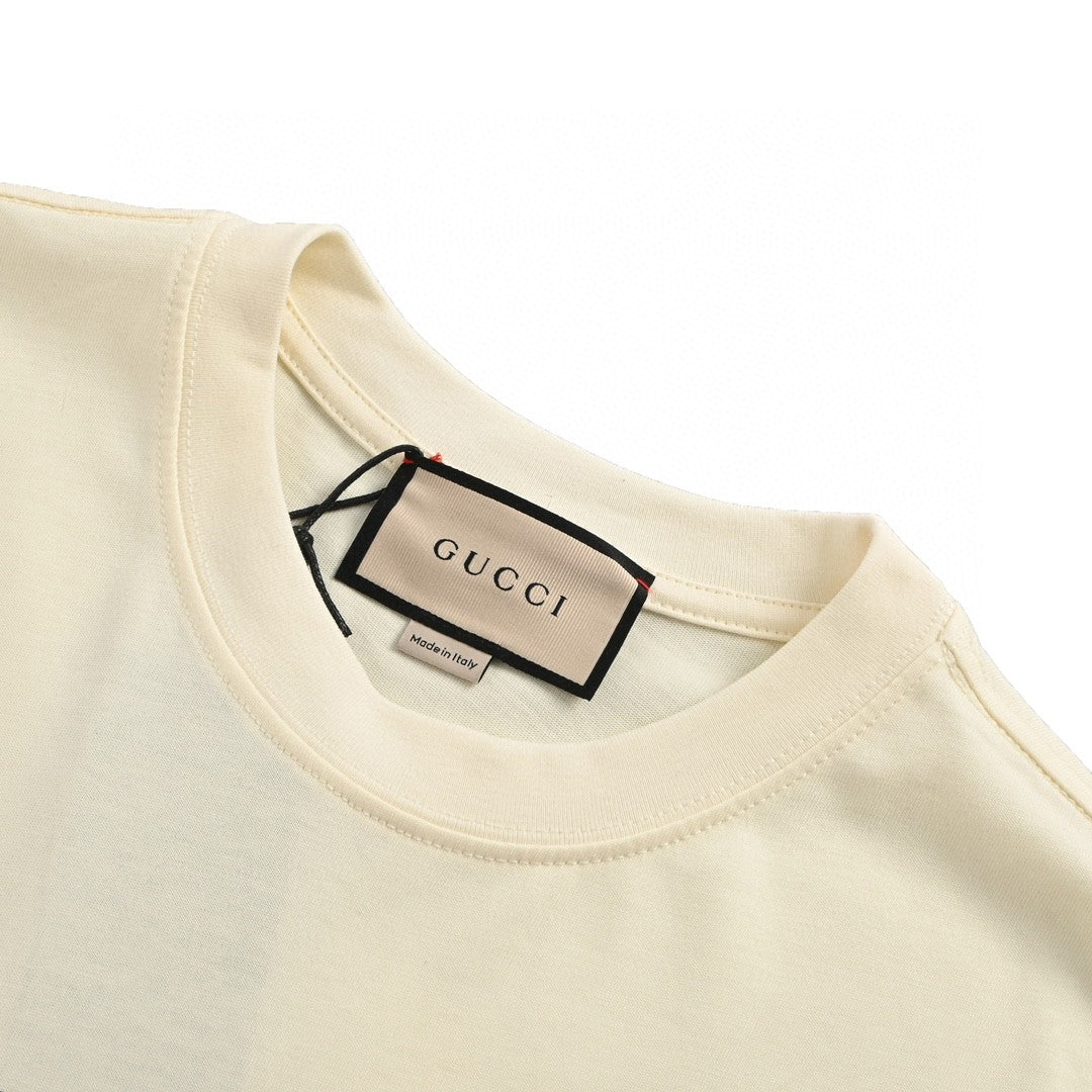 Camiseta Gucci color crema con dibujo de dragón