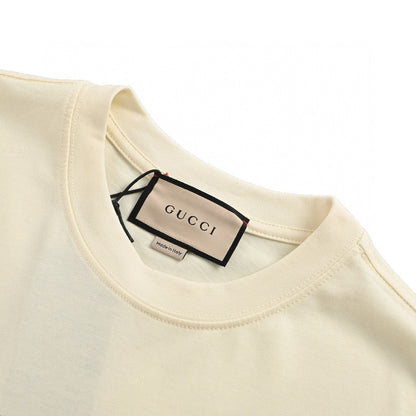 Camiseta Gucci color crema con dibujo de dragón