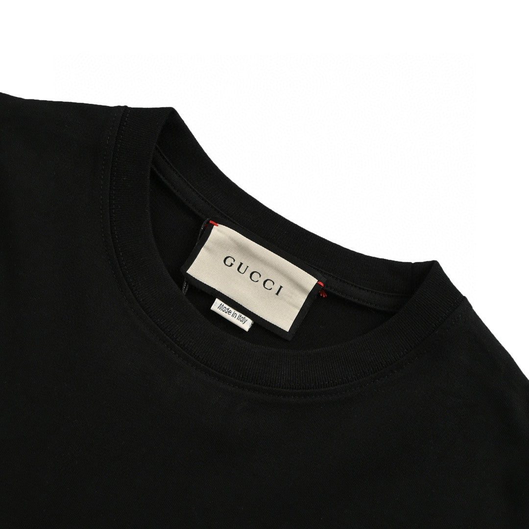 Gucci T-shirt With Heart Graphic - Black Unisex Streetwear Limited Edition - <span>Playful and stylish. Features a red heart cartoon graphic. Green and red stripe design with