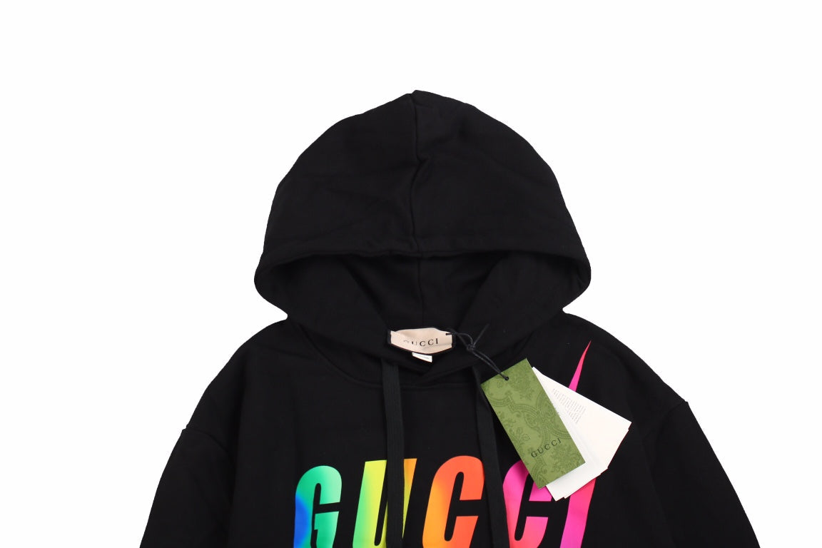 Gucci Rainbow Logo Hoodie - Black Unisex Streetwear Limited Edition - This black Gucci hoodie features a vibrant rainbow-colored 'GUCCI' logo on the front. It includes