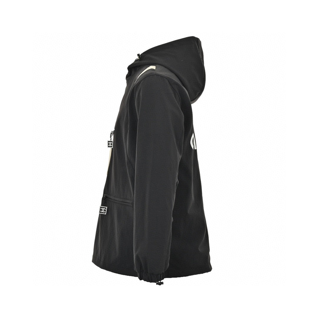 Chanel Two-tone Hooded Jacket - Black Unisex Streetwear Limited Edition - This Chanel jacket features a stylish black and beige two-tone design. It has a front