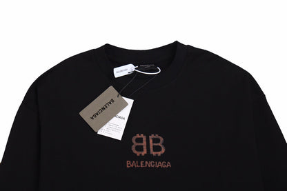 Balenciaga Long Sleeve T-shirt - Black Unisex Streetwear Limited Edition - Black long sleeve t-shirt with brown Balenciaga logo on the chest. Simple and minimalist design.