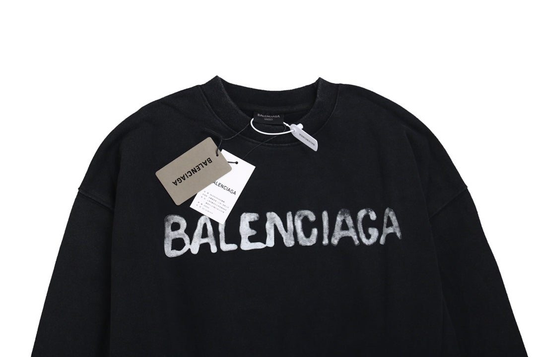 Balenciaga Sweatshirt - Black Unisex Streetwear Limited Edition - Black sweatshirt with white Balenciaga logo on the chest. Comfortable and relaxed fit. Ribbed cuffs