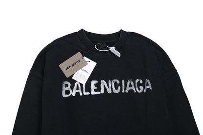 Balenciaga Sweatshirt - Black Unisex Streetwear Limited Edition - Black sweatshirt with white Balenciaga logo on the chest. Comfortable and relaxed fit. Ribbed cuffs