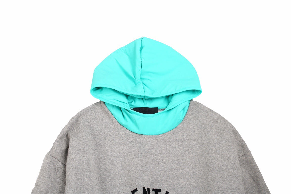 Fear Of God Essentials Hoodie - - Grey Unisex Streetwear Limited Edition - This grey Fear of God Essentials hoodie features a bold black 'ESSENTIALS FEAR OF GOD'