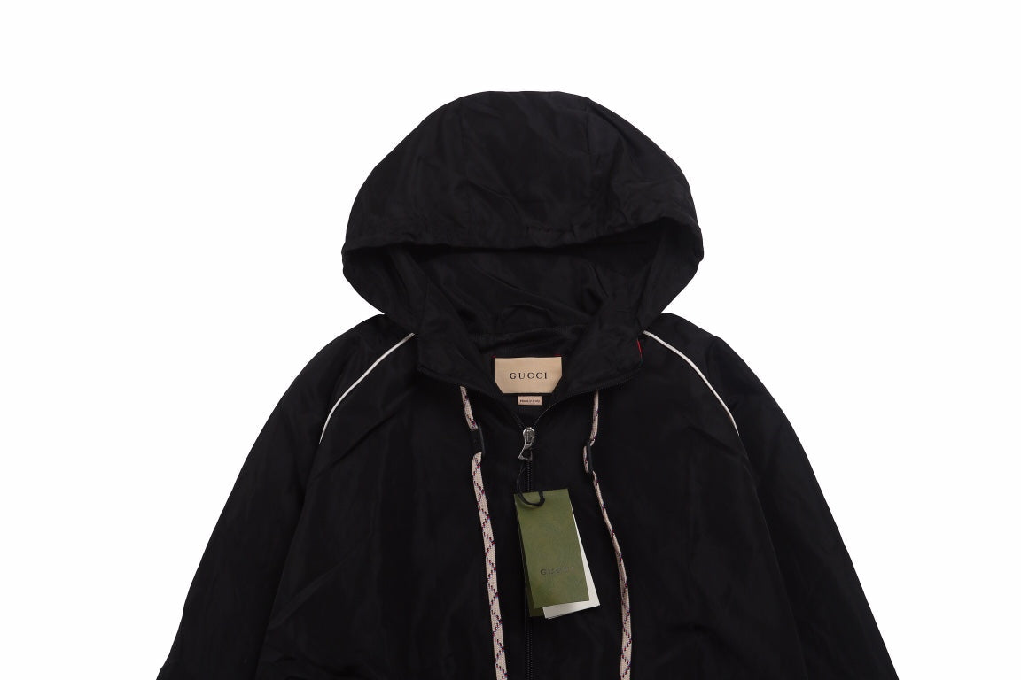 Gucci Jacket - Black Unisex Streetwear Limited Edition - Black hooded jacket with zip closure. Features white piping and drawstrings with Gucci branding. Side