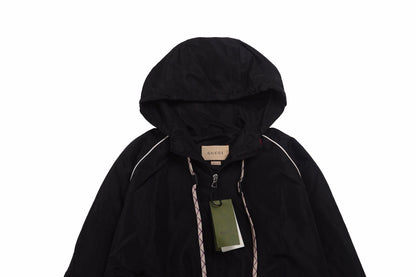 Gucci Jacket - Black Unisex Streetwear Limited Edition - Black hooded jacket with zip closure. Features white piping and drawstrings with Gucci branding. Side