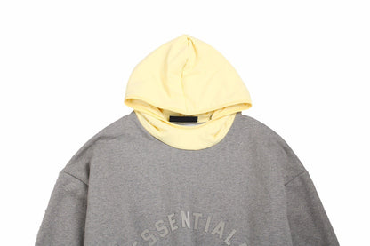 Fear Of God Essentials Hoodie - Grey With Hood - Yellow Unisex Streetwear Limited Edition - This grey Fear of God Essentials hoodie features a subtle 'ESSENTIALS FEAR OF GOD' logo