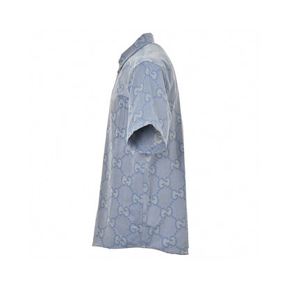 Gucci Allover Logo Denim Shirt - Blue Unisex Streetwear Limited Edition - This Gucci shirt features an allover GG logo design set against a light blue denim