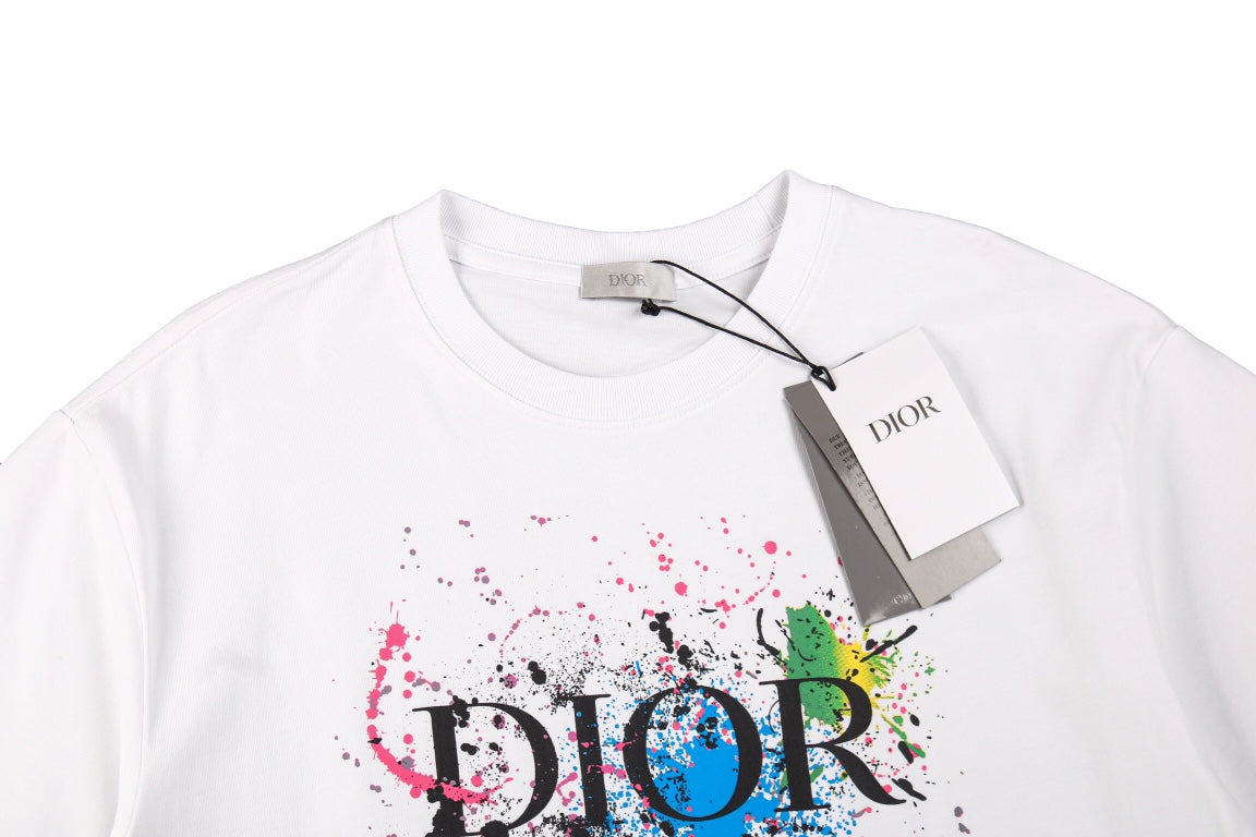 Dior Color Splash Graphic T-shirt - White Unisex Streetwear Limited Edition - This white Dior t-shirt is adorned with the iconic 'Dior' logo, splashed across the front