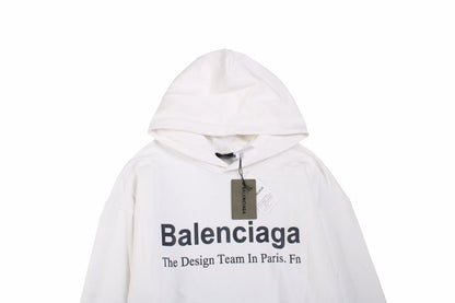 Balenciaga Paris Team Hoodie - White Unisex Streetwear Limited Edition - This Balenciaga hoodie in white features the text 'Balenciaga The Design Team In Paris. Fn'