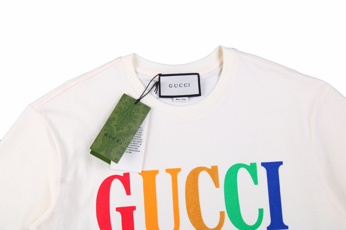 Gucci Cities Block Letter T-shirt - - White Unisex Streetwear Limited Edition - This white Gucci t-shirt proudly displays the 'GUCCI' logo in bold, colorful block letters across