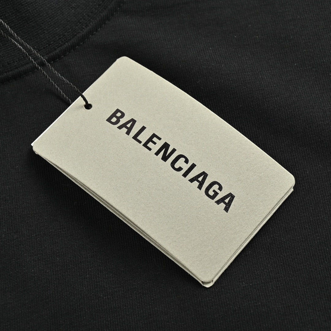 Balenciaga T-shirt - Overlapping Logo - Black Unisex Streetwear Limited Edition - <span>This Balenciaga t-shirt features a bold design with overlapping logos on the front. The black