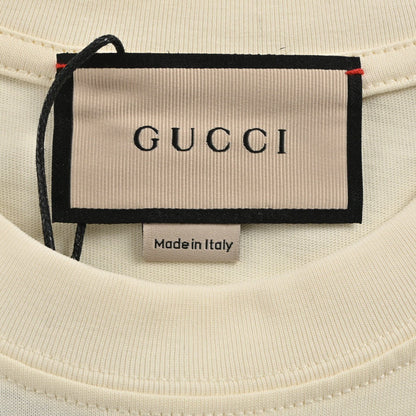 Gucci T-shirt With Bear Graphic - Cream Unisex Streetwear Limited Edition - <span>Charming and trendy. Features a colorful bear graphic with the Gucci logo. Made from premium