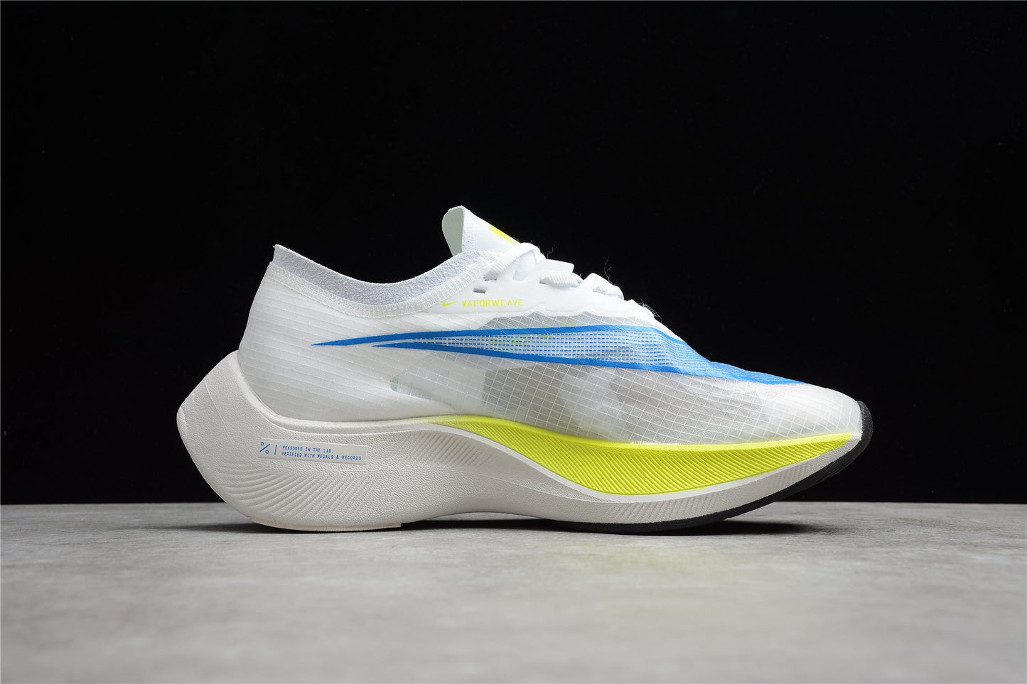 Zoom - Vaporfly Ne - T% 2 White blue And Yellow Unisex Streetwear Limited Edition - ### Nike ZoomX Vaporfly NEXT% 2 The Nike ZoomX Vaporfly NEXT% 2 is a top-of-the-line