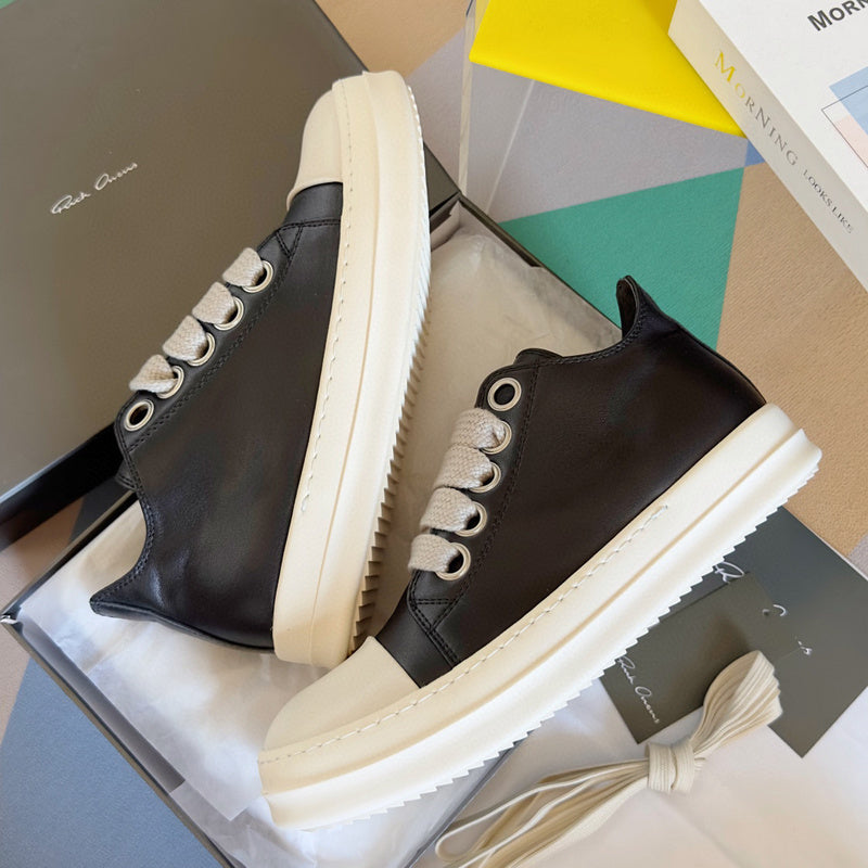 Rick Owens Low-top Sneakers - Black Unisex Streetwear Limited Edition - **Rick Owens Black Low-Top Sneakers: Modern Elegance and Superior Craftsmanship** Introducing the Rick Owens Black