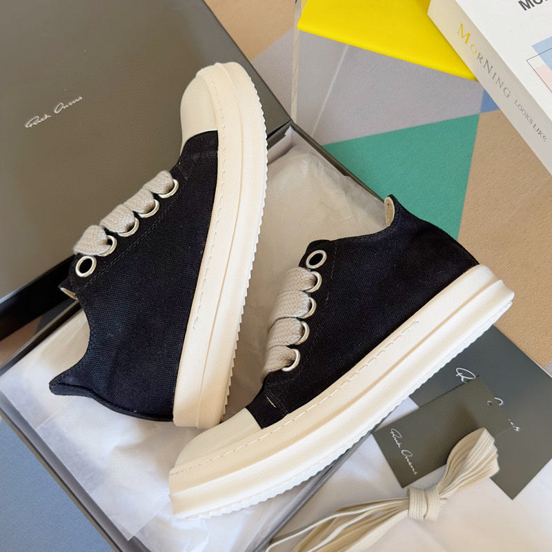 Rick Owens Canvas Low-top Sneakers - Black Unisex Streetwear Limited Edition - **Rick Owens Black Canvas Low-Top Sneakers: Modern Minimalism with Superior Craftsmanship** Introducing the Rick Owens