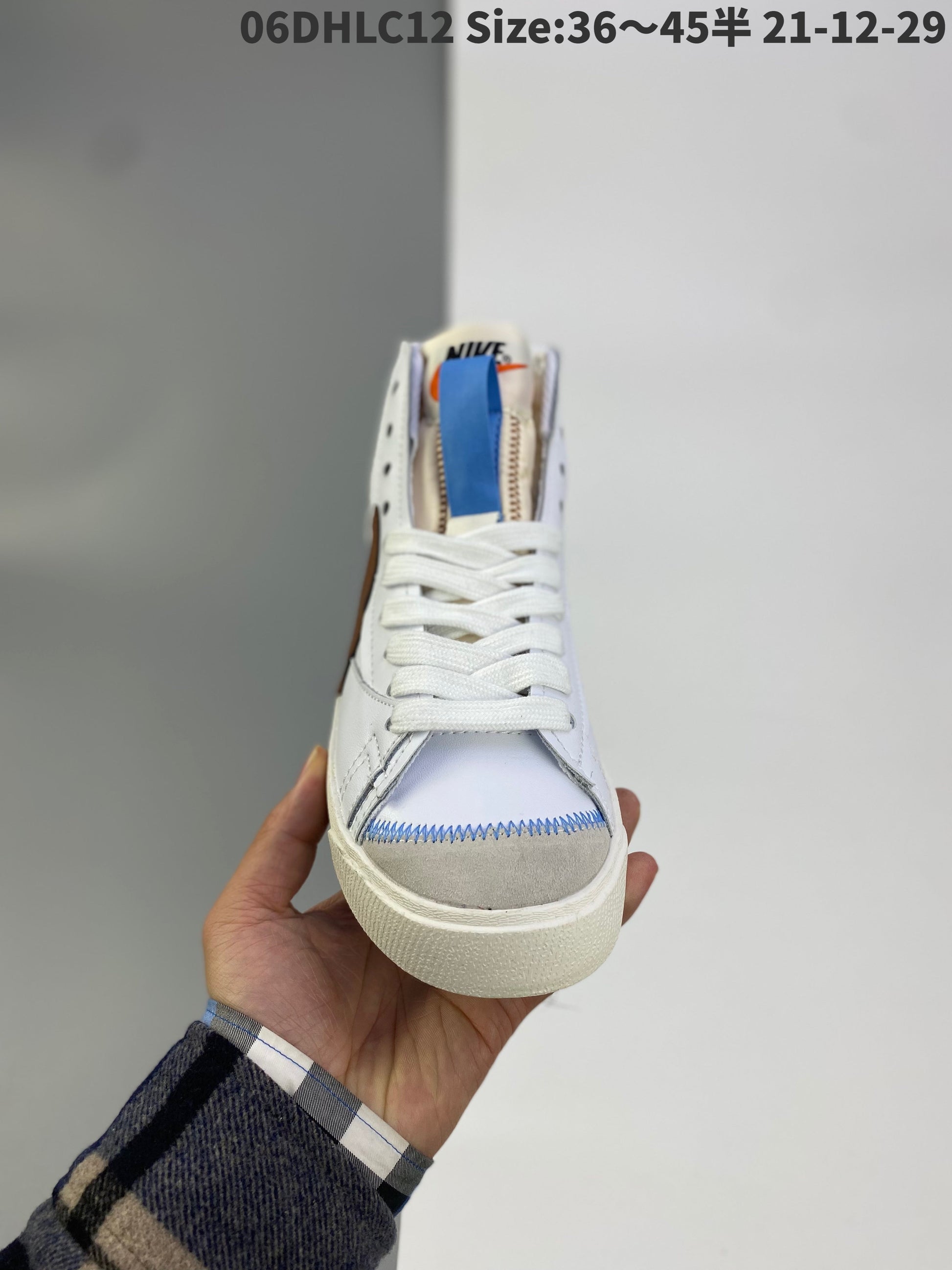Nike Blazer Mid'1977 Vintage - White Unisex Streetwear Limited Edition - The Nike Blazer Mid '1977 Vintage in Brown brings a refined, earthy tone to the