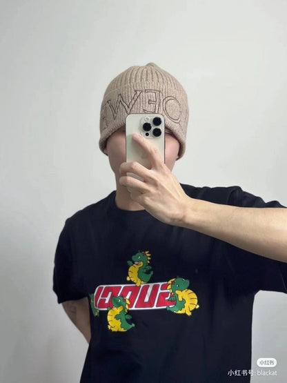 Camiseta negra Gucci con estampado de dinosaurio