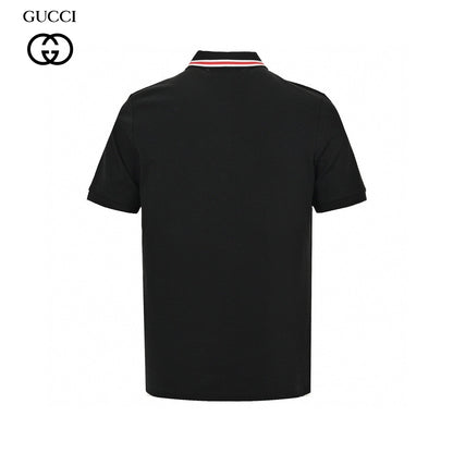 Polo con logo de llamas de Gucci