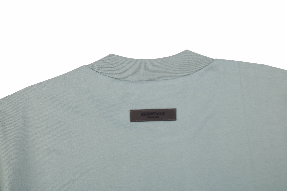 Fear Of God Essentials T-shirt - Green Unisex Streetwear Limited Edition - <p dir='ltr'><span>A minimalist Fear of God Essentials t-shirt. Light green color with 'ESSENTIALS' text