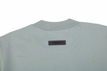 Fear Of God Essentials T-shirt - Green Unisex Streetwear Limited Edition - <p dir='ltr'><span>A minimalist Fear of God Essentials t-shirt. Light green color with 'ESSENTIALS' text