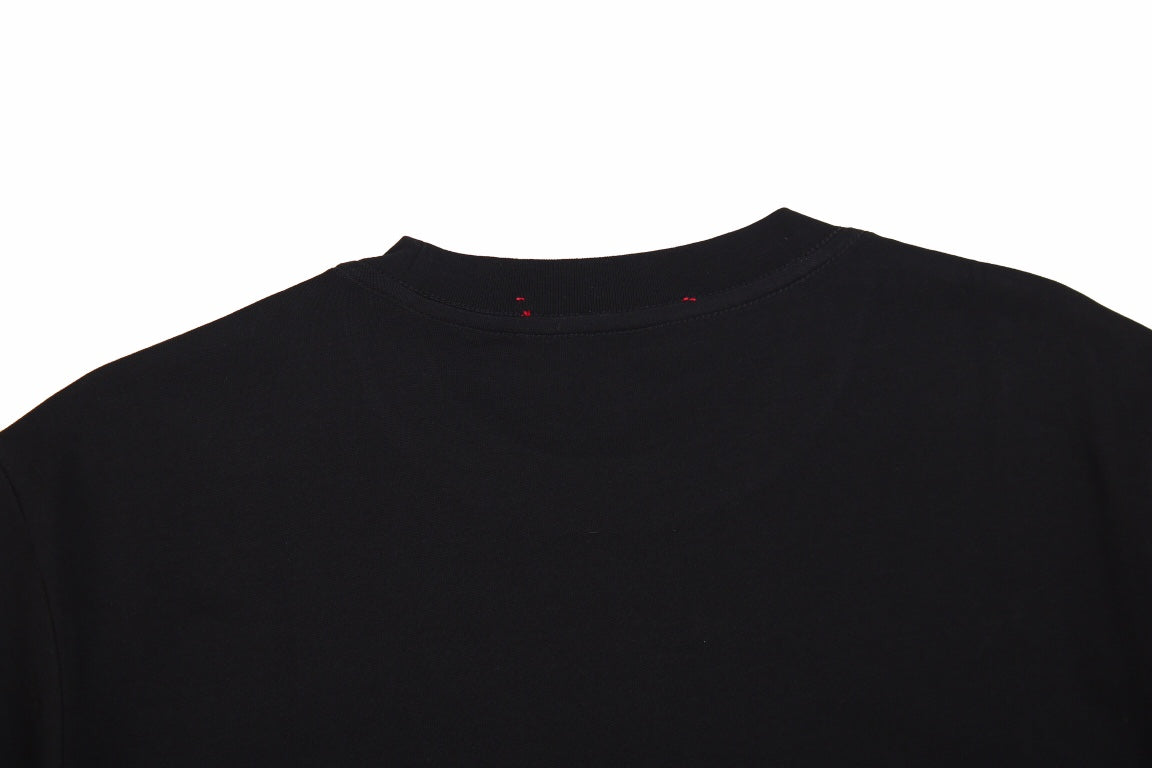 Camiseta gráfica de setas de Gucci