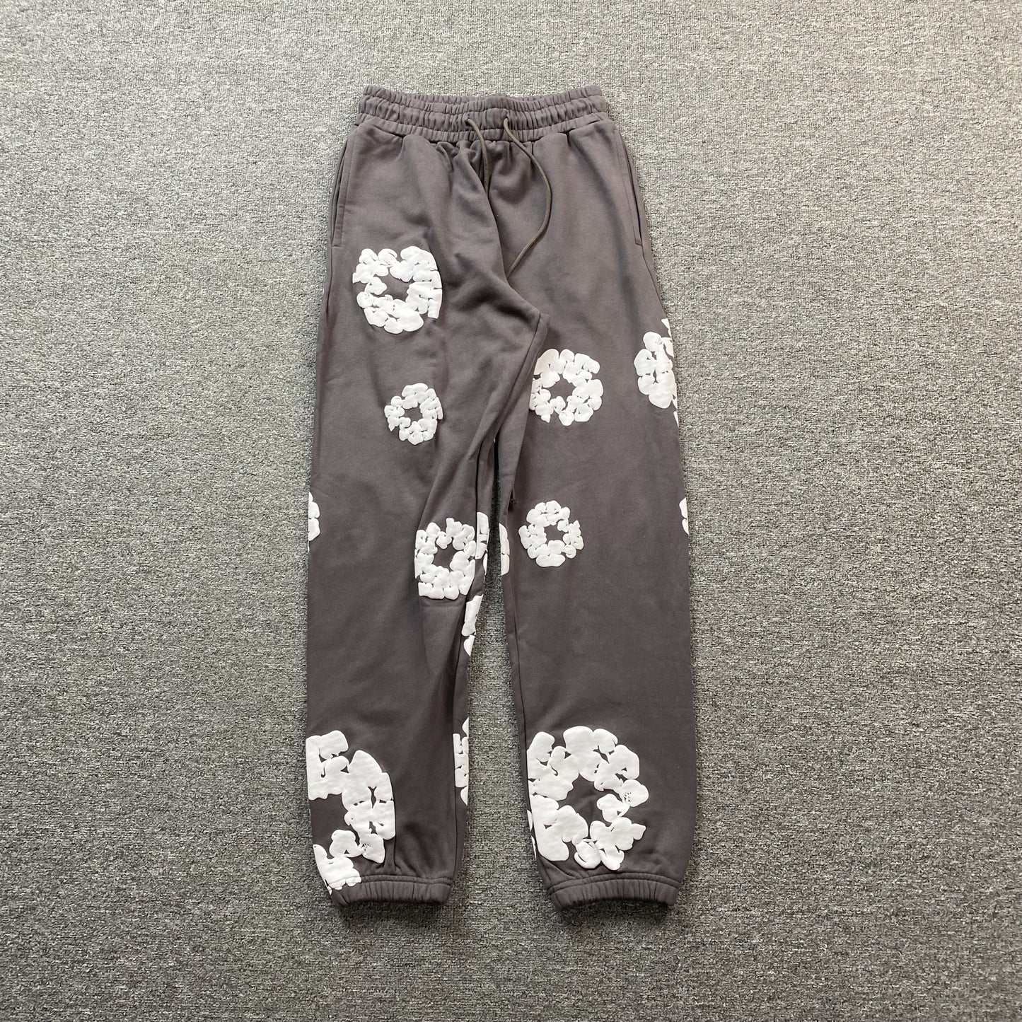 DENIM Tears Cotton Wreath Sweatpants Olive - Red Unisex Streetwear Limited Edition - The Denim Tears Cotton Wreath Sweatpants Olive Replica deliver the perfect balance of comfort and