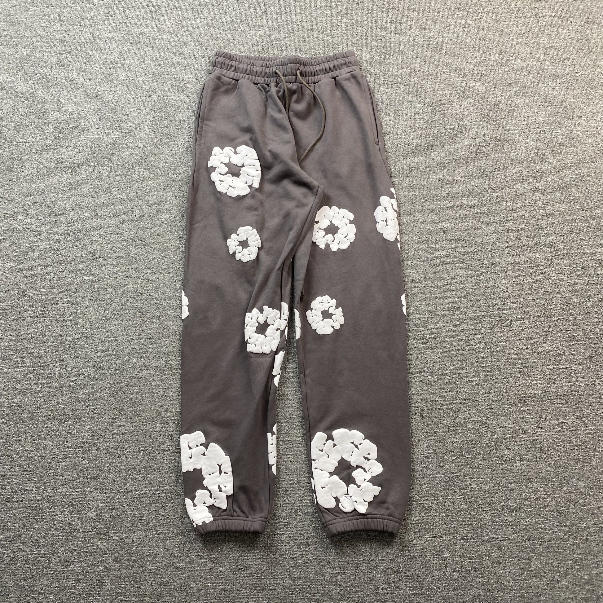 DENIM Tears Cotton Wreath Sweatpants Olive - Red Unisex Streetwear Limited Edition - The Denim Tears Cotton Wreath Sweatpants Olive Replica deliver the perfect balance of comfort and