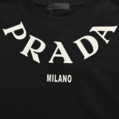 Prada T-shirt - With Bold Branding - Black Unisex Streetwear Limited Edition - <span>This Prada t-shirt features a sleek black base with bold 'PRADA MILANO' branding across the