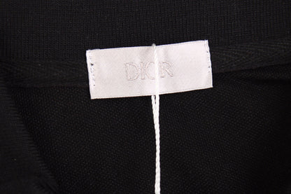 Polo Dior con diseño de logotipo floral