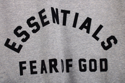Fear Of God Essentials Hoodie - - Grey Unisex Streetwear Limited Edition - This grey Fear of God Essentials hoodie features a bold black 'ESSENTIALS FEAR OF GOD'