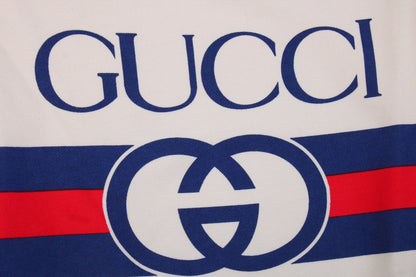 Gucci Sweatshirt - Red Unisex Streetwear Limited Edition - Cream sweatshirt with bold GUCCI logo. Blue and red stripe detailing across chest and sleeves.