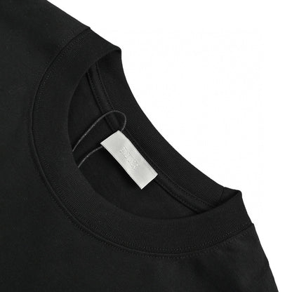 Dior Christian Dior Graphic T-shirt - Black Unisex Streetwear Limited Edition - This Dior t-shirt features a bold graphic design with 'Christian Dior' text and star-like elements.