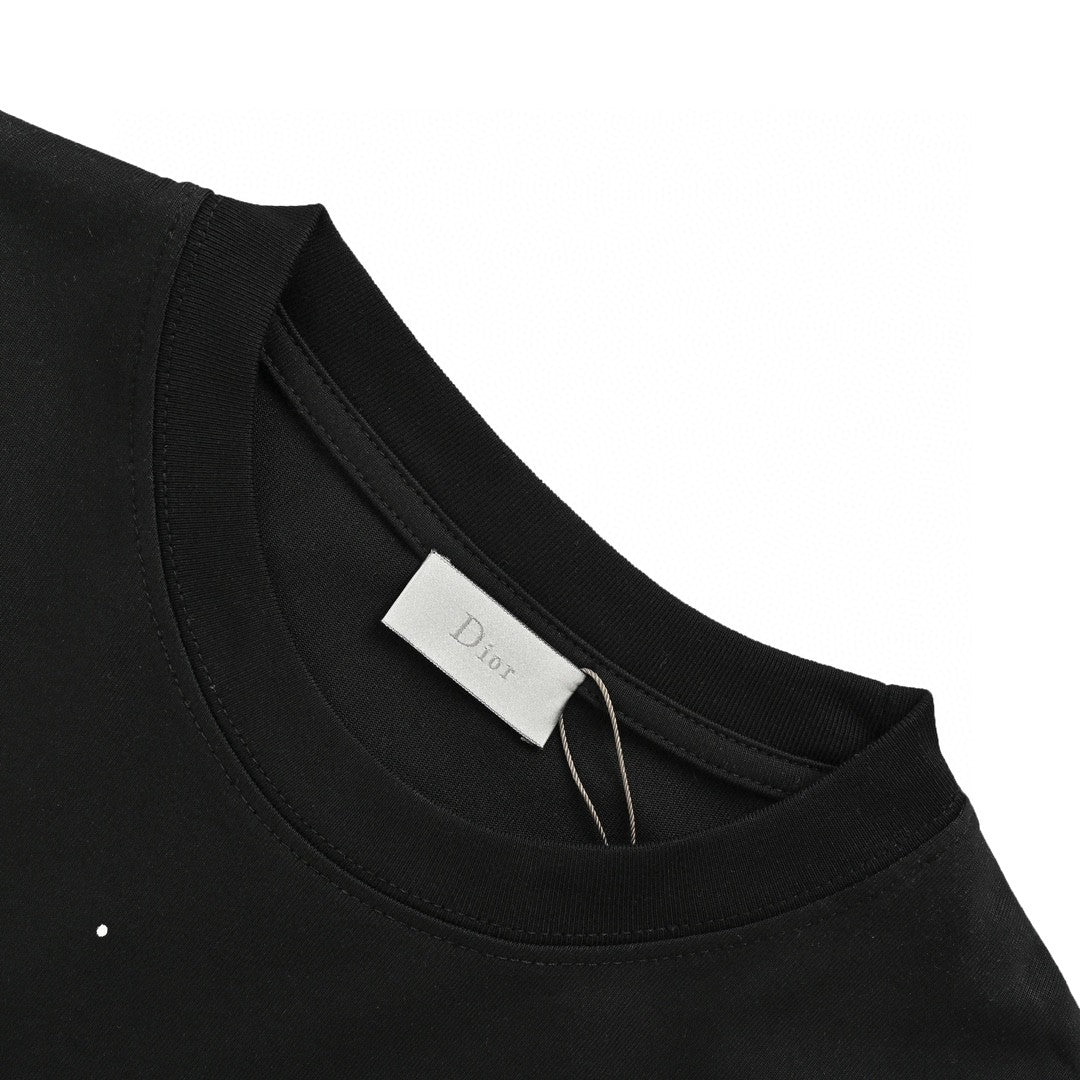 Dior Multicolor Logo T-shirt - Black Unisex Streetwear Limited Edition - This Dior t-shirt features a vibrant multicolor 'Dior' logo with paint splatter details on the