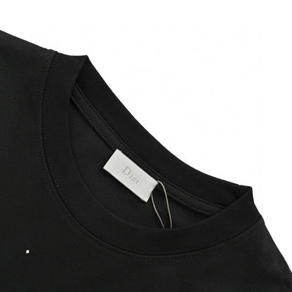 Dior Multicolor Logo T-shirt - Black Unisex Streetwear Limited Edition - This Dior t-shirt features a vibrant multicolor 'Dior' logo with paint splatter details on the