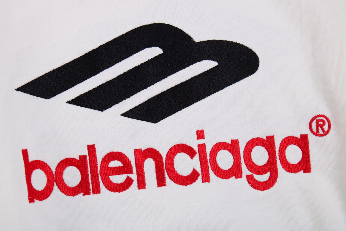Balenciaga Hoodie - White Unisex Streetwear Limited Edition - This Balenciaga hoodie features a bold black and red logo on the front. Crafted from