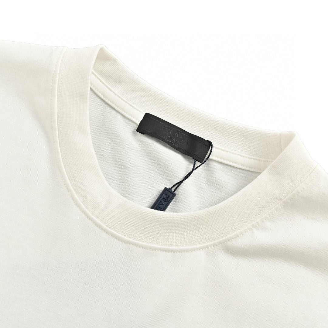 Prada T-shirt - Black Unisex Streetwear Limited Edition - This Prada t-shirt features a minimalist white design. It has the Prada Milano logo printed