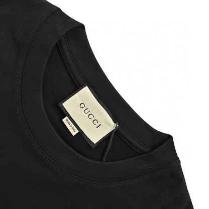 Gucci Triangle Logo T-shirt - Black Unisex Streetwear Limited Edition - This Gucci t-shirt features a subtle triangle logo on the chest. The shirt is primarily