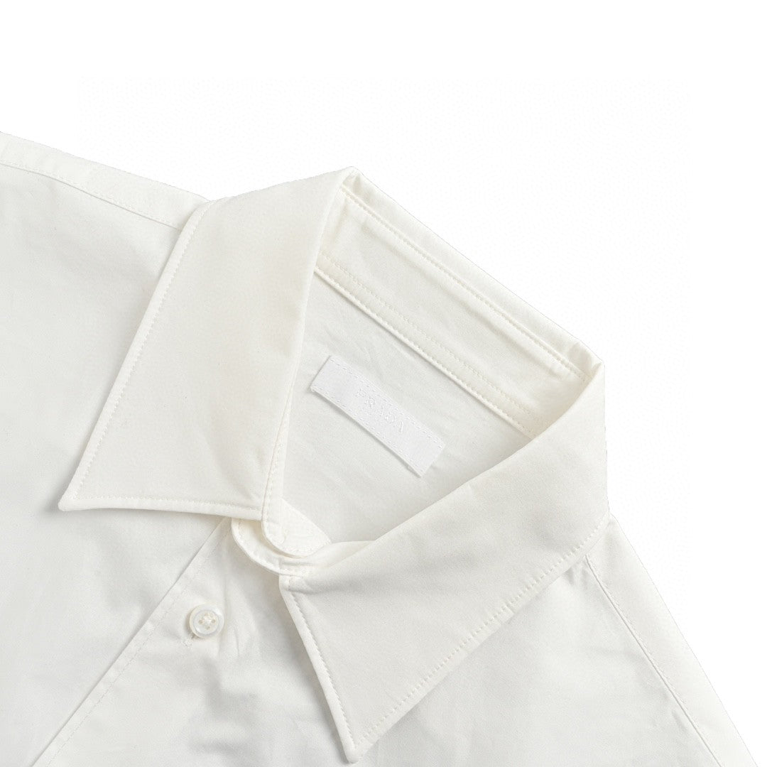 Prada Short-sleeve Button-up Shirt (white) Unisex Streetwear Limited Edition - This white Prada short-sleeve button-up shirt combines classic design with modern elements. The shirt features