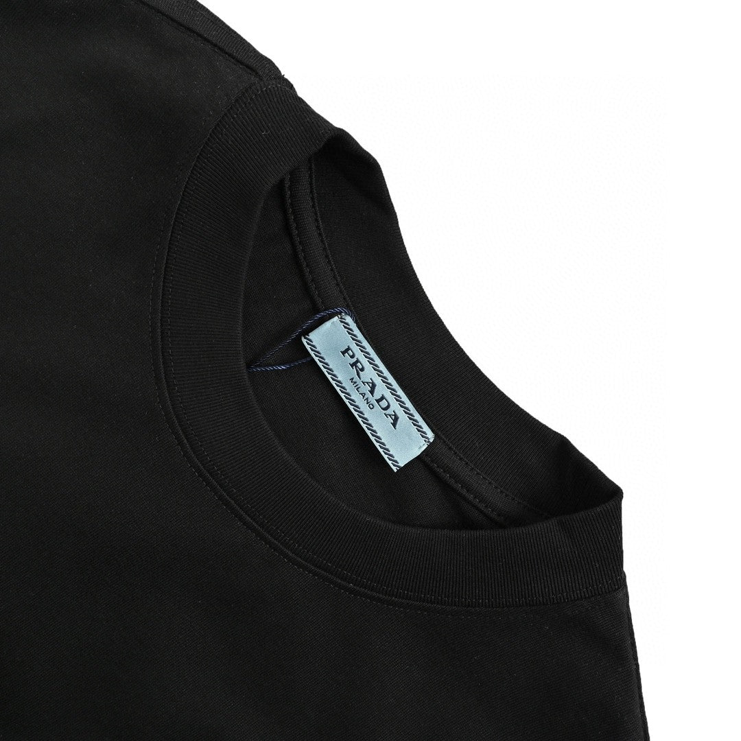 Prada T-shirt With Geometric Pocket Design - Black Unisex Streetwear Limited Edition - The Prada Black T-Shirt with Geometric Pocket Design is a contemporary and chic addition to