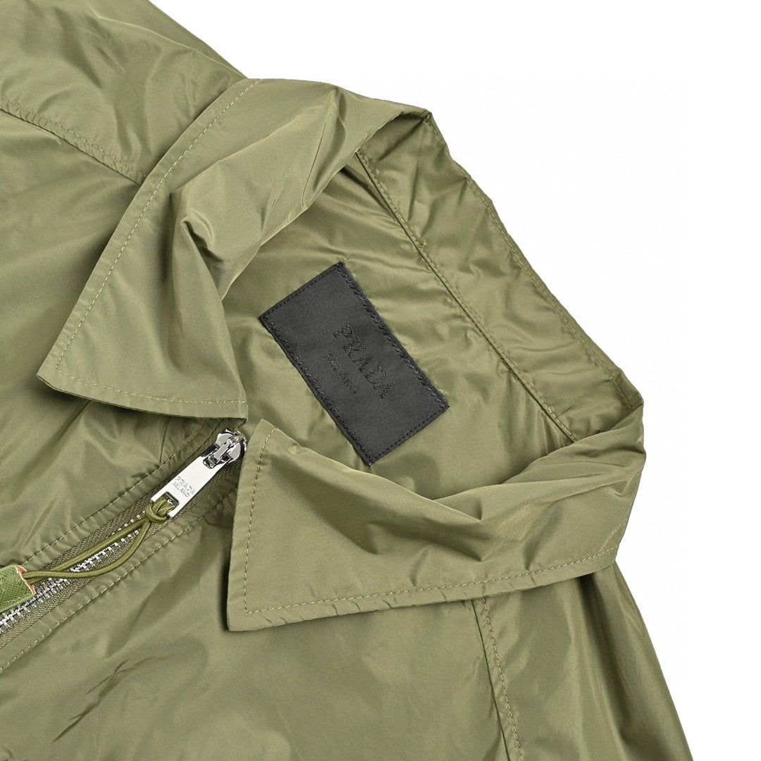 Prada Olive Short-sleeve Jacket - Green Unisex Streetwear Limited Edition - This Prada jacket features a stylish design with an olive green color. It includes a