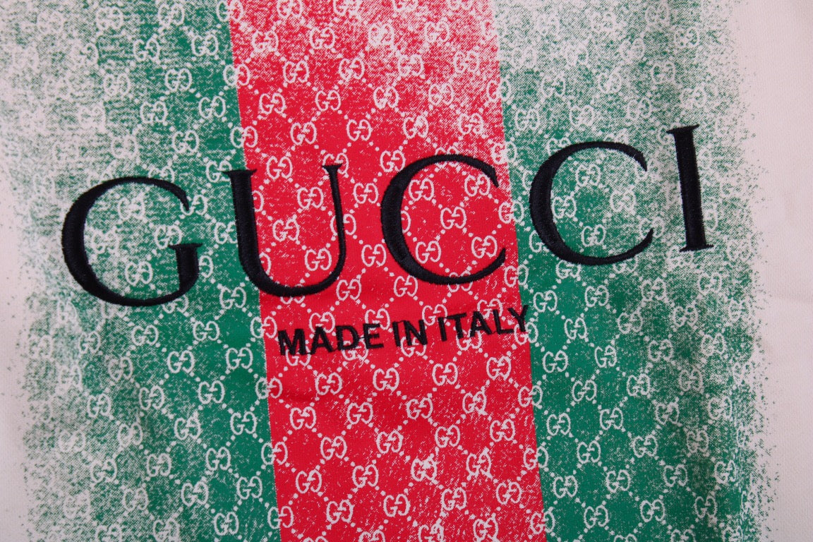 Gucci Sweatshirt - White Unisex Streetwear Limited Edition - White sweatshirt featuring the iconic Gucci green and red web design. Overlaid with the 'GUCCI'