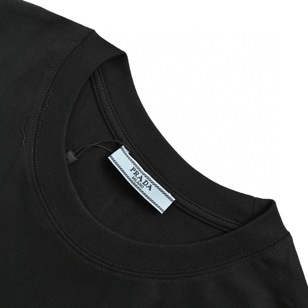 Prada Graphic Logo T-shirt (black) Unisex Streetwear Limited Edition - This black Prada T-shirt features a striking graphic logo print on the front, capturing the