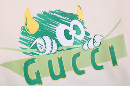 Gucci Monster Graphic Sweatshirt - Cream Unisex Streetwear Limited Edition - This Gucci sweatshirt in cream features a playful monster graphic with vibrant colors and the